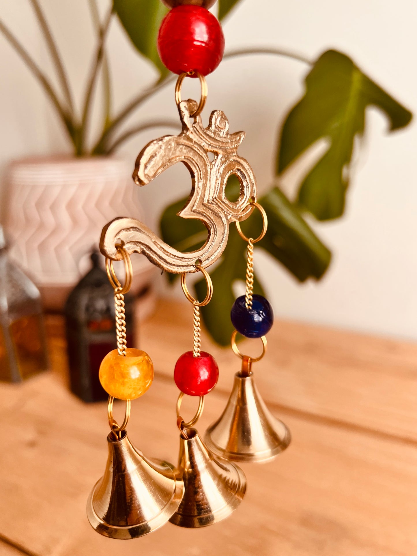 Mini brass wind chime bells Om symbol mini bell chime colourful glass beads recycled metal gold brass chime bells indoor outdoor handmade fair trade ethically sourced mini windchime