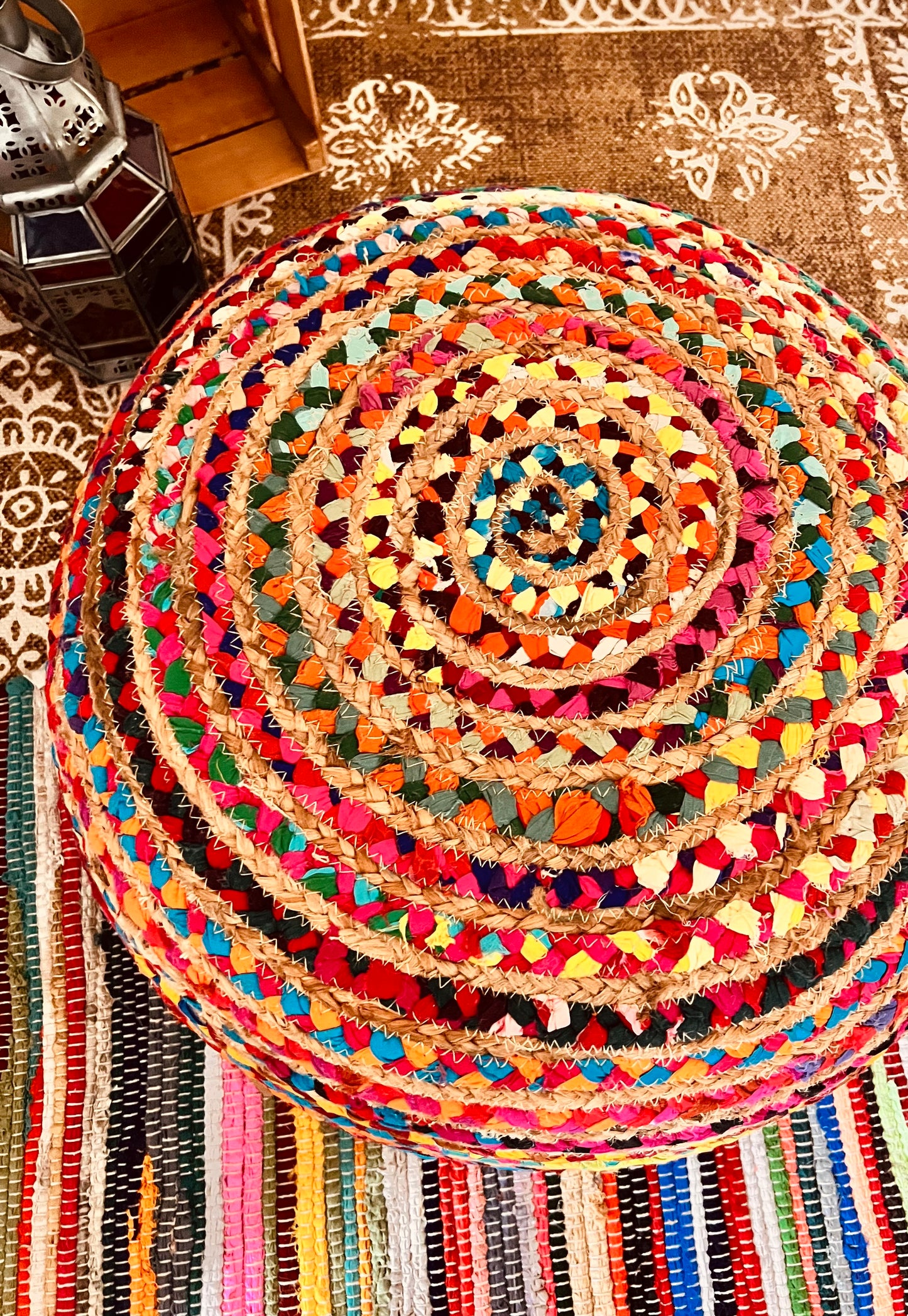 Handmade fair trade ethically sourced round jute Indian chindi cotton footstool pouffe rainbow multicoloured large pouf spiral woven fabric pattern