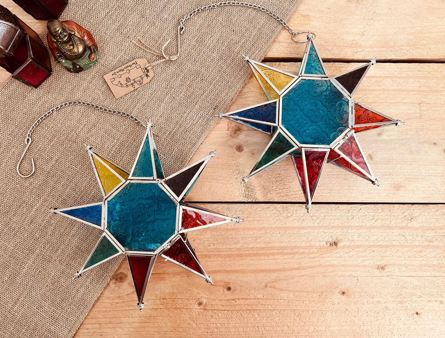 Hanging glass star Moroccan lantern with blue glass & multicoloured detail. Hanging on a long chain with metal hook hanger. Handmade bohemian hippie home glass tea-light lantern. T light candle holder. Fair trade & ethically sourced home decor.