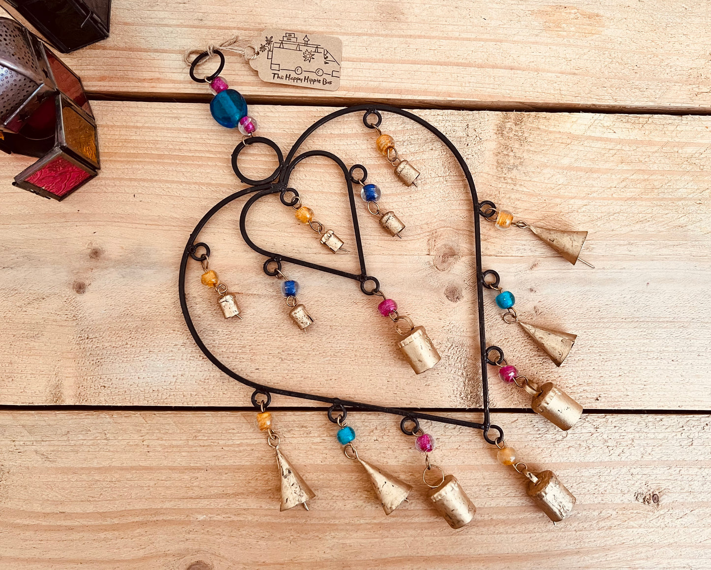Recycled metal ironwork hanging heart bells wind chime indoor outdoor handmade fair trade boho hanging Indian bell chime, black hearts and gold bells with colourful beads wind bells