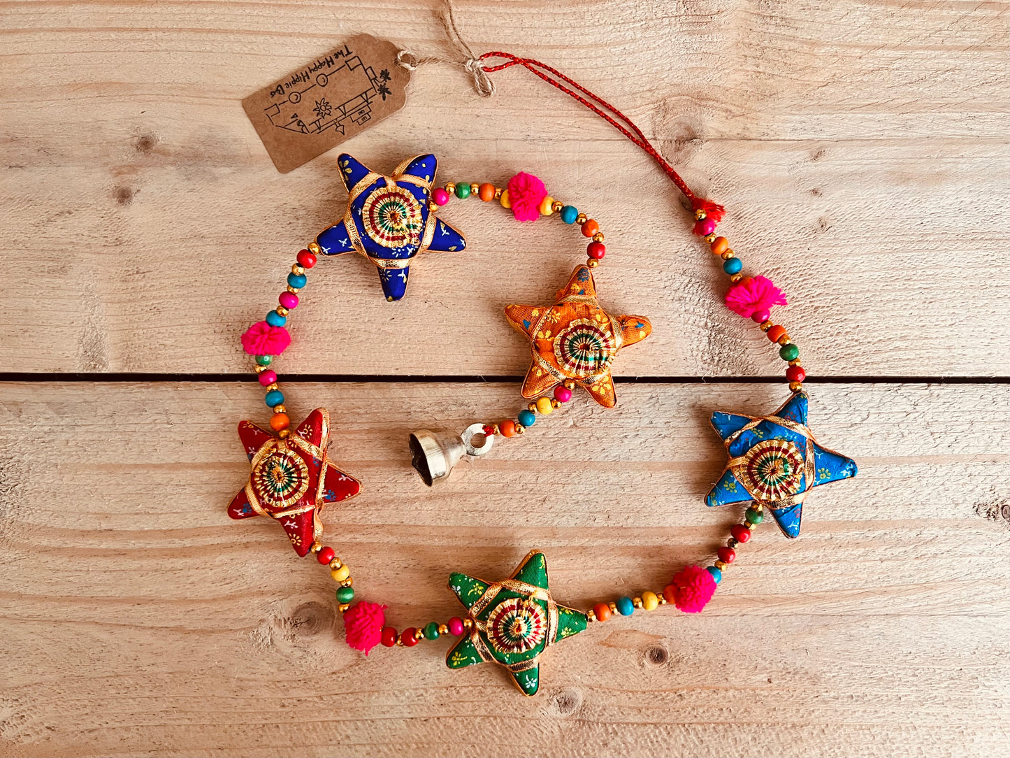 Handmade fair trade ethically sourced star and pom Pom hanging bells wind chime decoration string of stars and bell multicoloured sari fabric bells