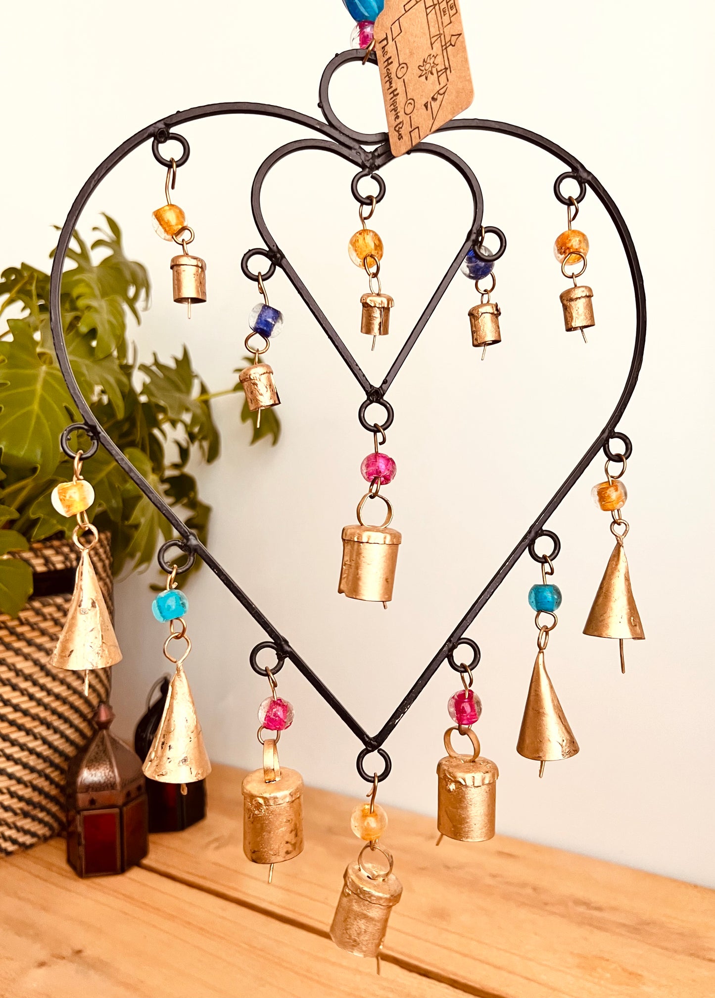 Recycled metal ironwork hanging heart bells wind chime indoor outdoor handmade fair trade boho hanging Indian bell chime, black hearts and gold bells with colourful beads wind bells