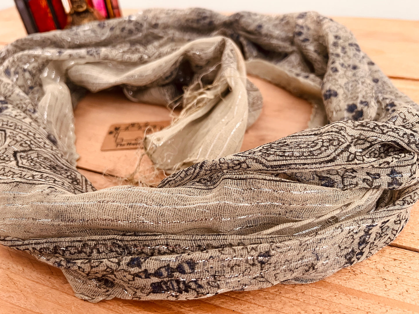 Close up Pebble gray Colourful Handmade lightweight boho ethnic print scarf with silver lurex thread, soft lightweight shawl scarves with tassel edge, boho hippie chic accessories