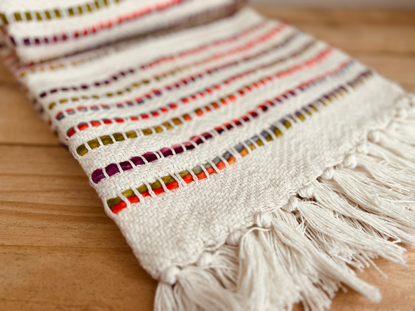 Handmade fair trade ethical cotton chair sofa tassel throw white and rainbow