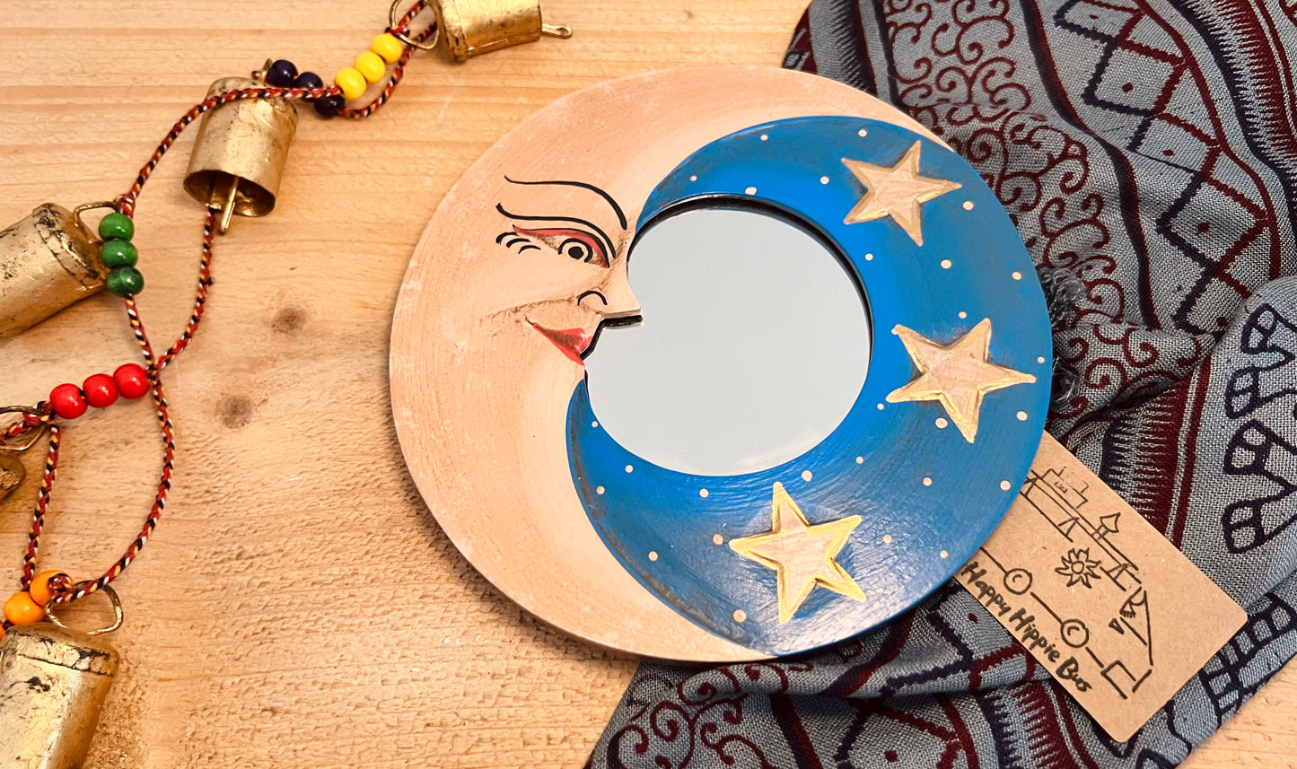 Round glass mini wooden wall hanging mirror with hippie boho moon & stars detailing in blue & yellow colour. Bohemian vintage style rustic finish small mini round wooden framed mirror. Handmade, Fair Trade, Ethical, Sustainable home decor.