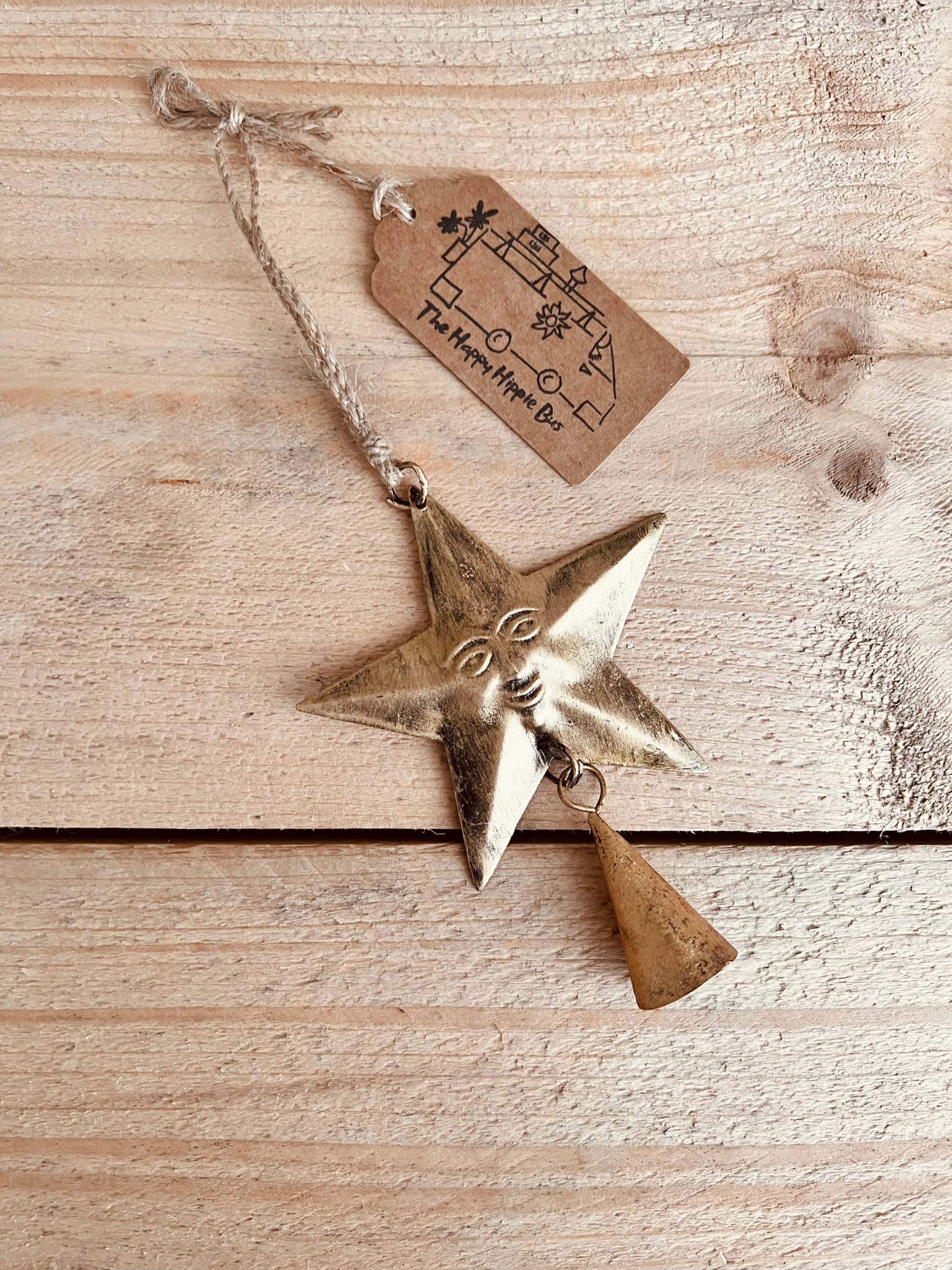 small hanging star with smiling face bell
