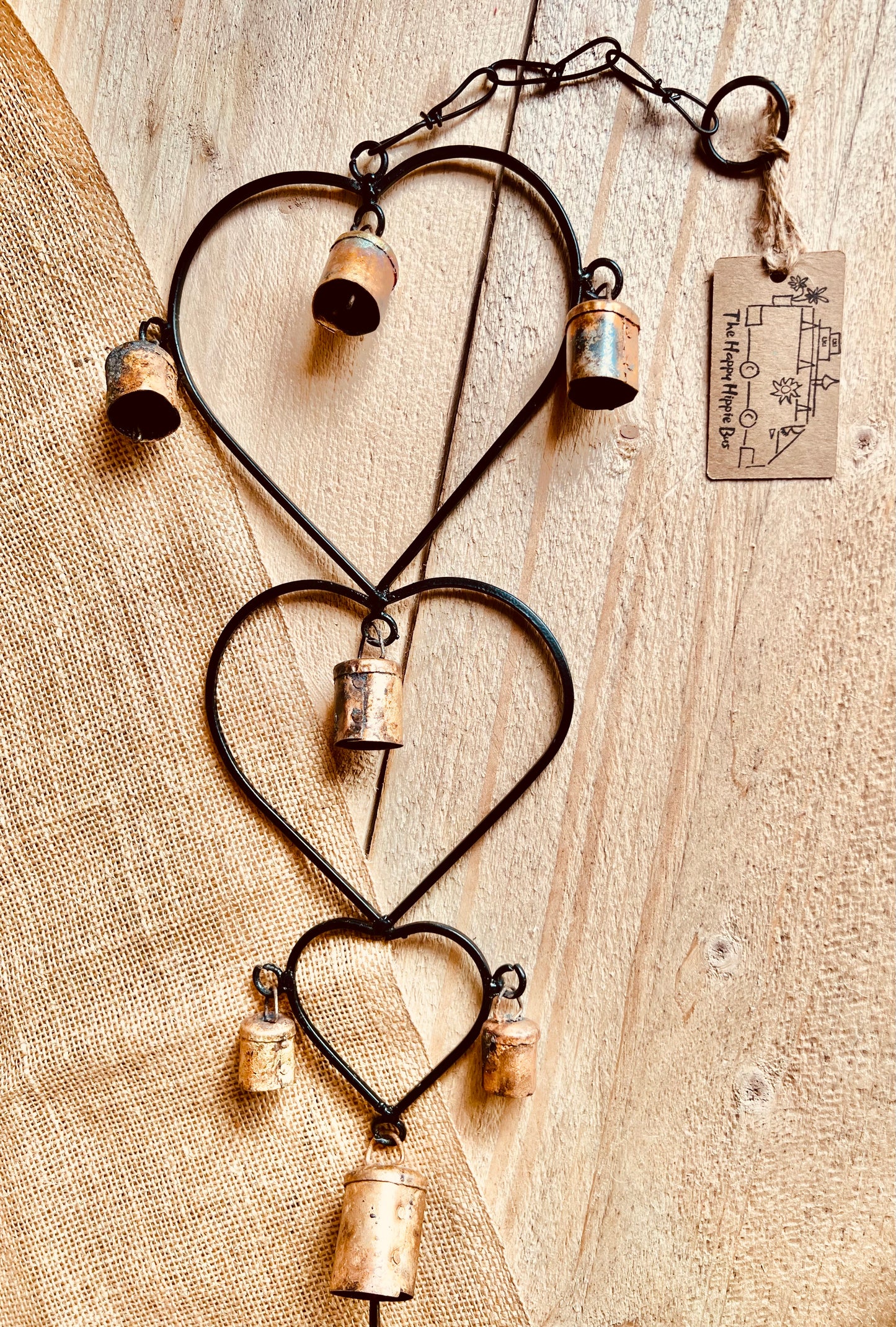 Rustic handmade recycled metal iron brass bells wind chime heart hanging decoration bell windchimes indoor outdoor home garden decor fair trade and ethically sourced