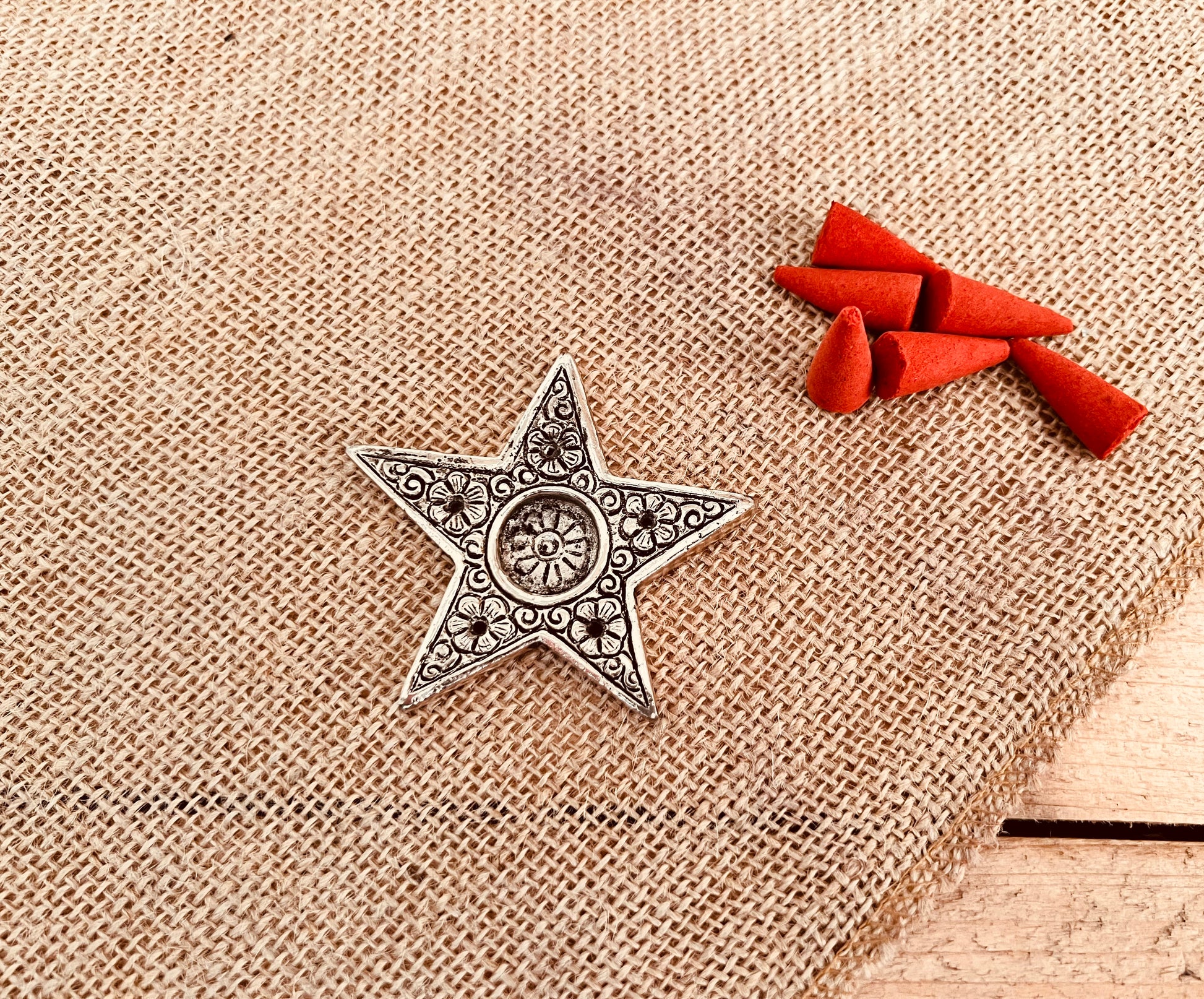 Small metal star incense holder