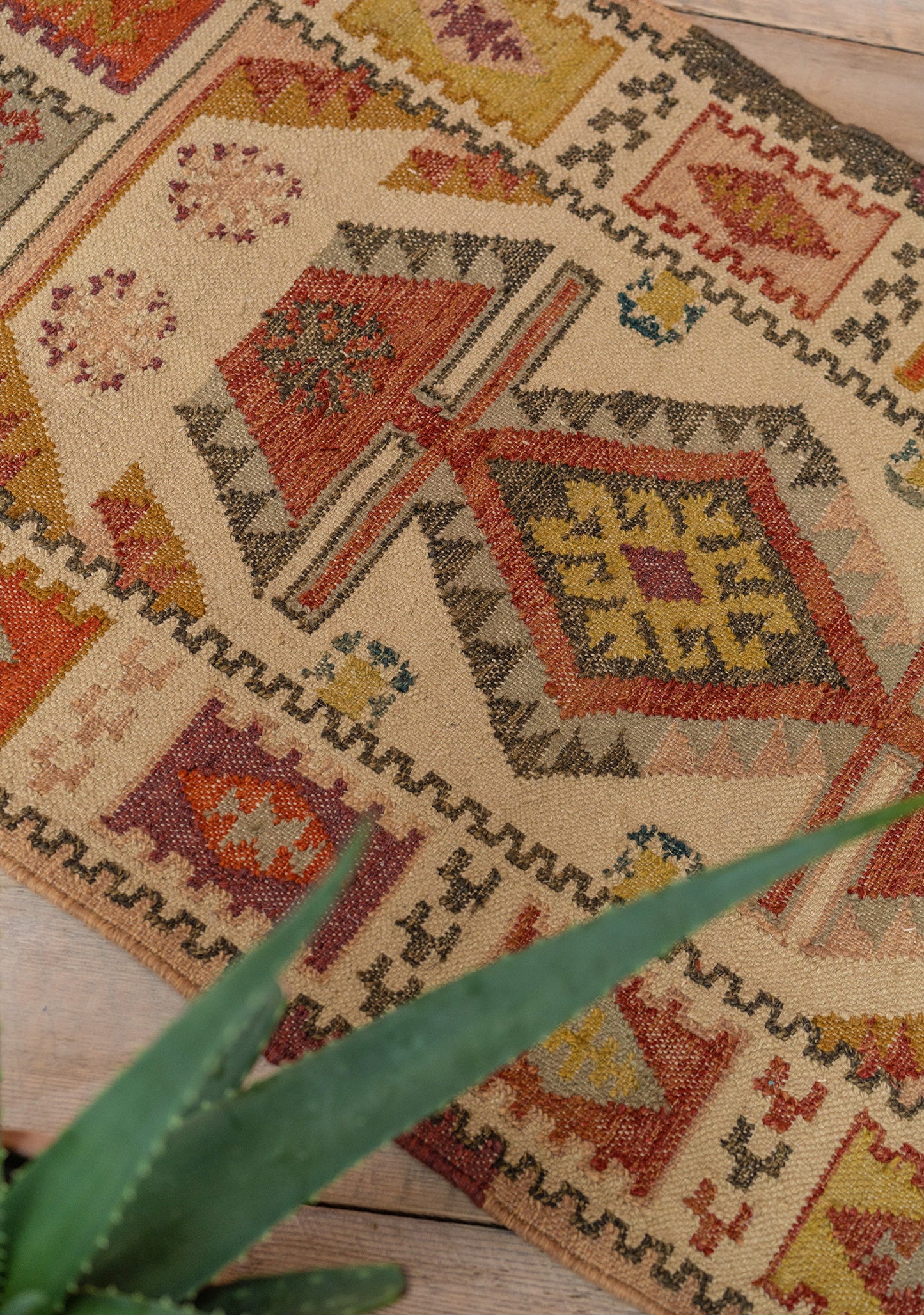 Close-up of a patterned rug with geometric designs Handmade Fair Trade Ethically Sourced Rug