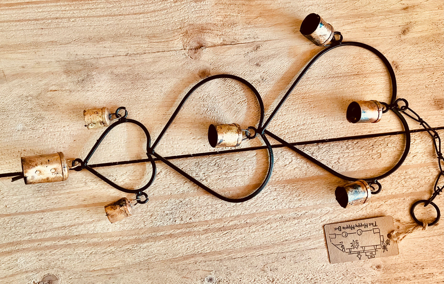 Rustic handmade recycled metal iron brass bells wind chime heart hanging decoration bell windchimes indoor outdoor home garden decor fair trade and ethically sourced