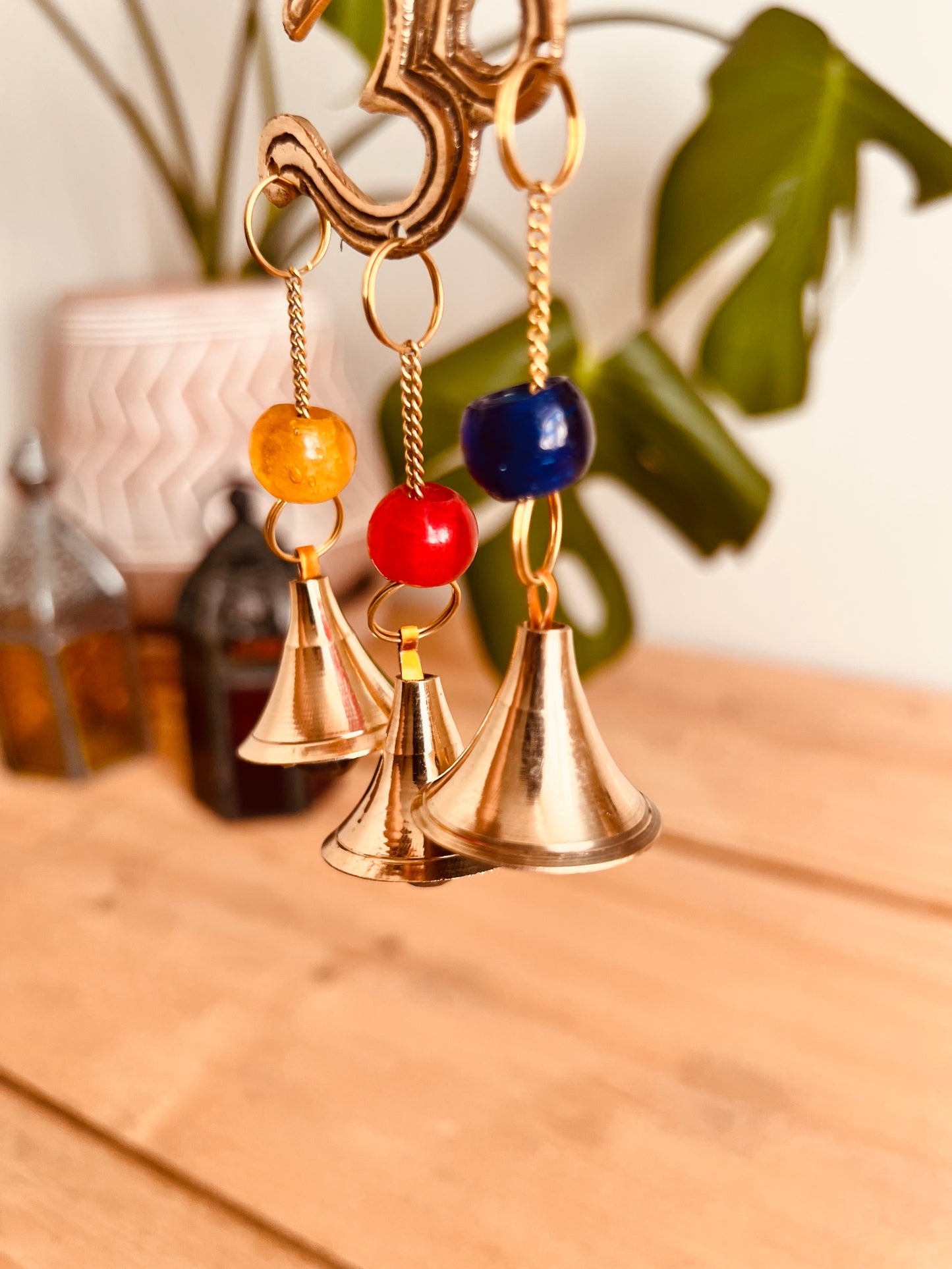 Mini brass wind chime bells Om symbol mini bell chime colourful glass beads recycled metal gold brass chime bells indoor outdoor handmade fair trade ethically sourced mini windchime