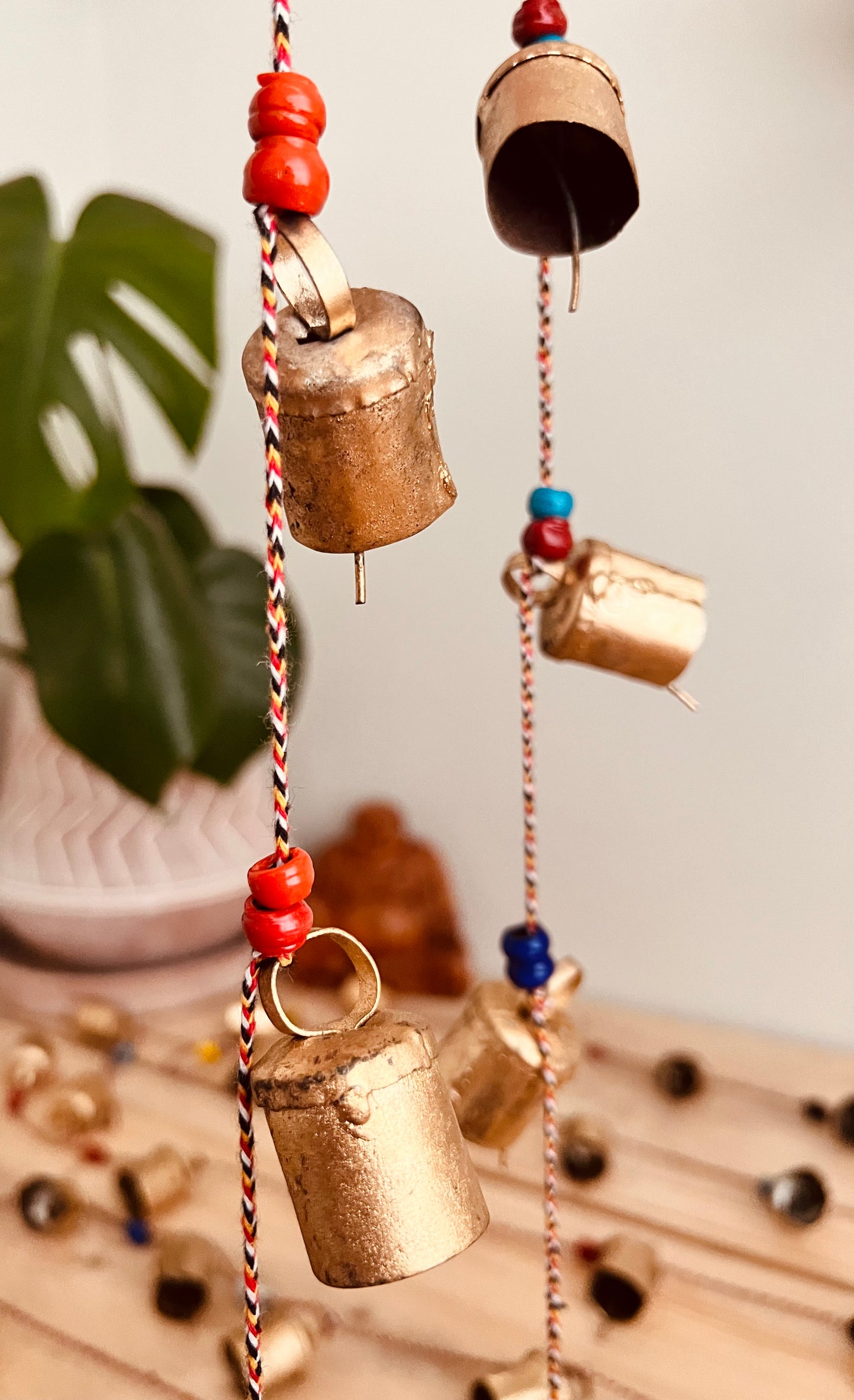 Handmade fair trade ethically sourced Indian string of recycled metal bells wind chime bell & beads