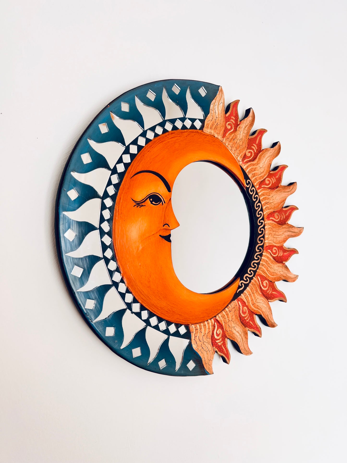 Handmade sun and moon wall mirror with mosaic mirror tile detailing