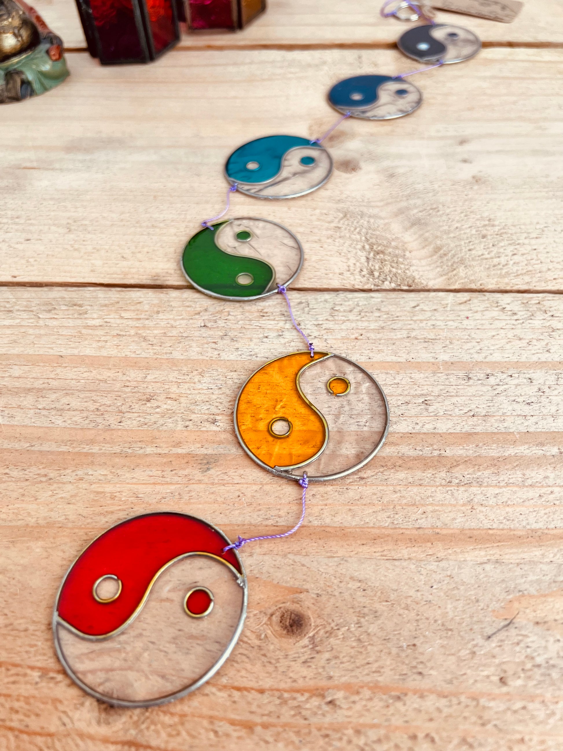 Decorative stained glass yin yang sun catcher with chakra rainbow design for positive energy