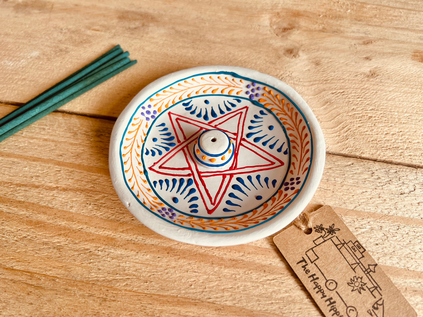 Round Clay Indian incense holder burner plate hand painted pentagram design incense tray white multicoloured painted design handmade fair trade ethically sourced 