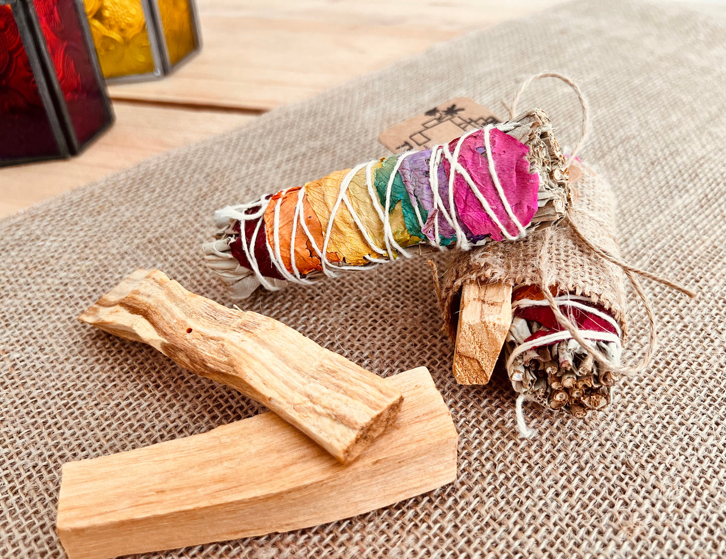 White sage smudge sticks with colourful rose petals wrapped with Palo Santo sticks, home fragrance, cleansing ritual incense 