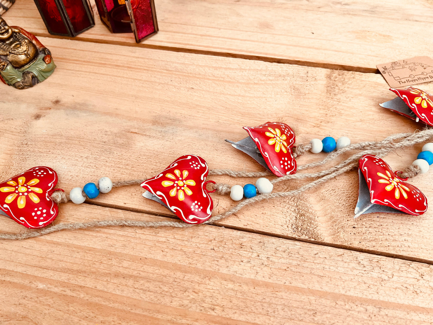 Hand painted red & yellow heart shaped metal bells wind chime on jute twine with glass beads, hanging home living decor bells chime, handmade, fair trade, ethically sourced string of Indian bells