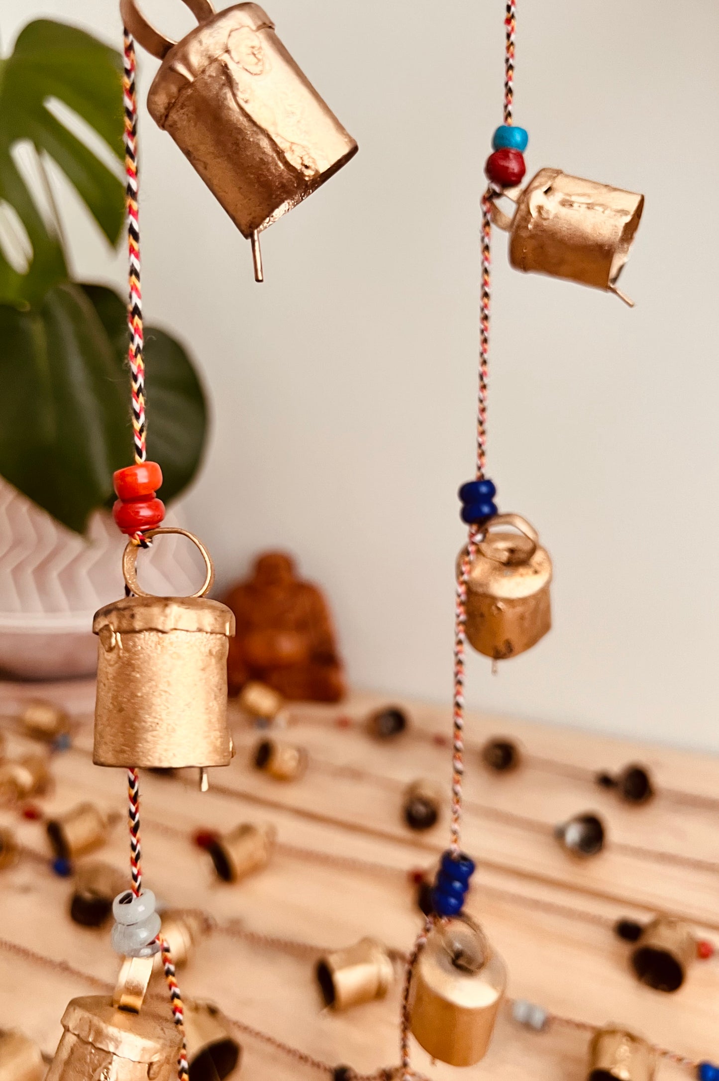 Handmade fair trade ethically sourced Indian string of recycled metal bells wind chime bell & beads