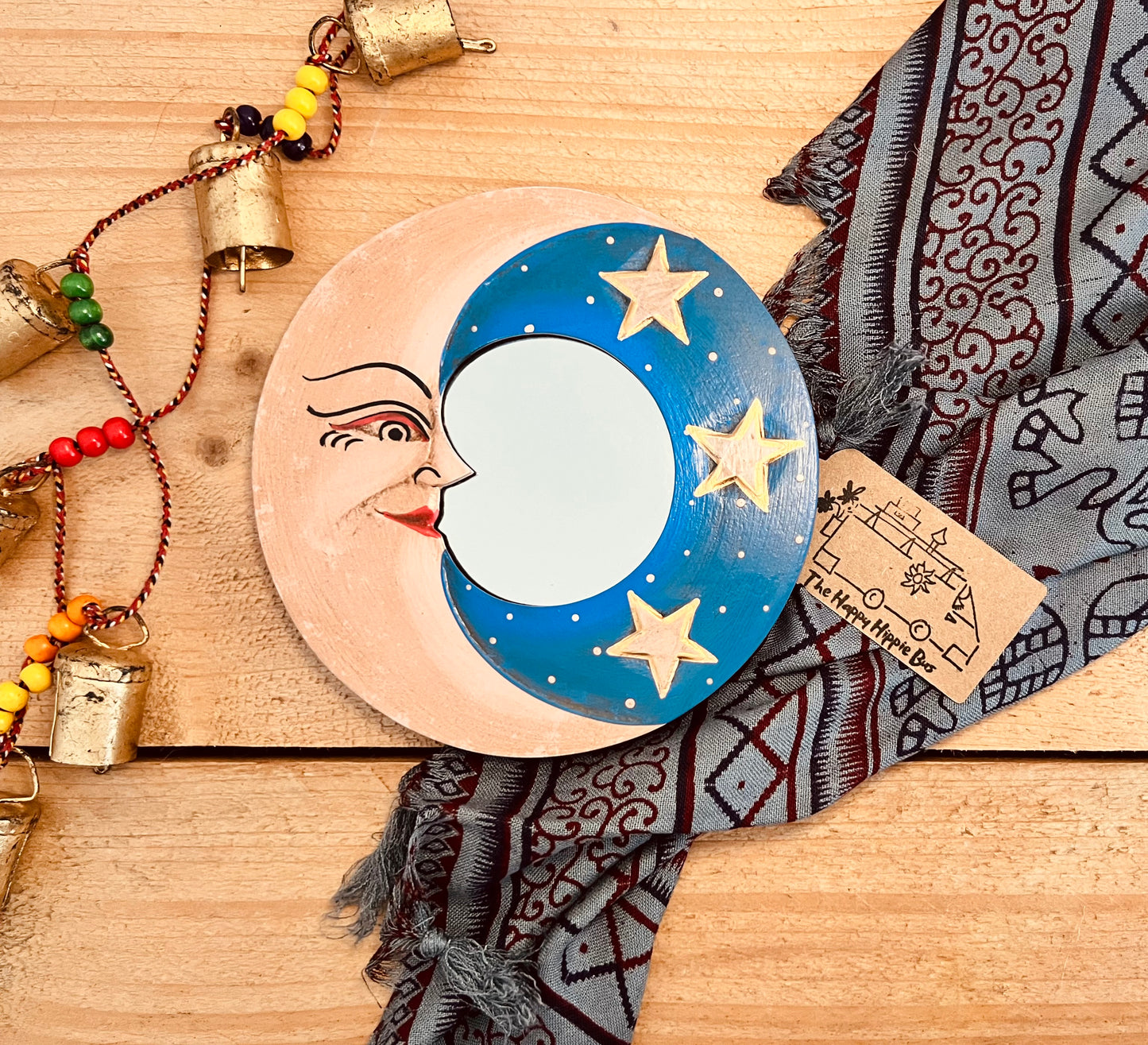 mini wooden wall hanging mirror with hippie boho moon & stars detailing in blue & yellow colour. Bohemian vintage style rustic finish small mini round wooden framed mirror. Handmade, Fair Trade, Ethical, Sustainable home decor.