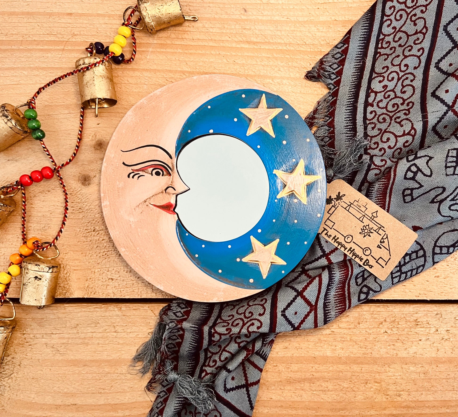 mini wooden wall hanging mirror with hippie boho moon & stars detailing in blue & yellow colour. Bohemian vintage style rustic finish small mini round wooden framed mirror. Handmade, Fair Trade, Ethical, Sustainable home decor.