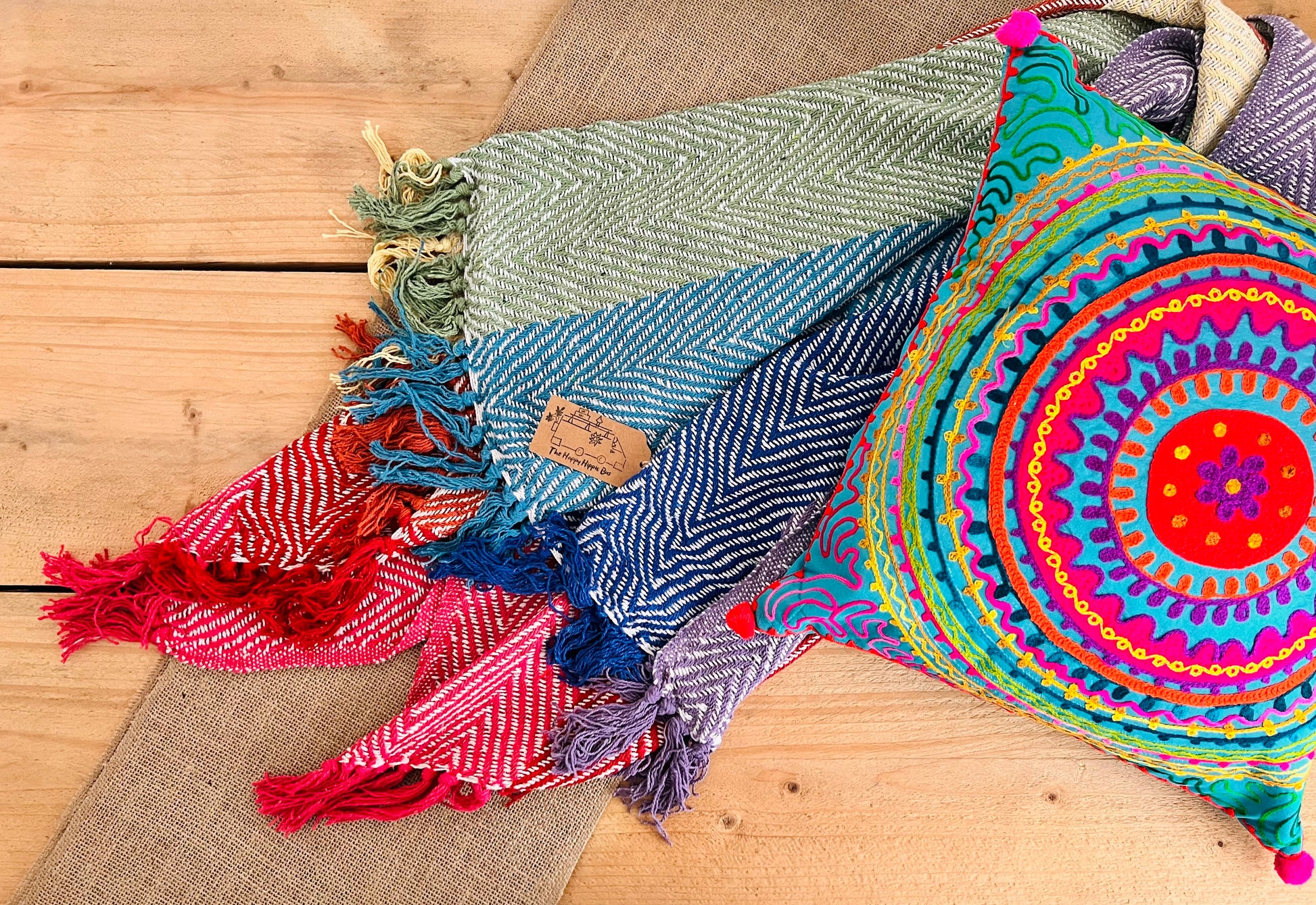 Herringbone weave handmade rainbow stripe throw blanket, colourful rainbow colour stripes with colourful tassel edge, boho hippie bohemian decor blanket throw, fair trade & ethically sourced