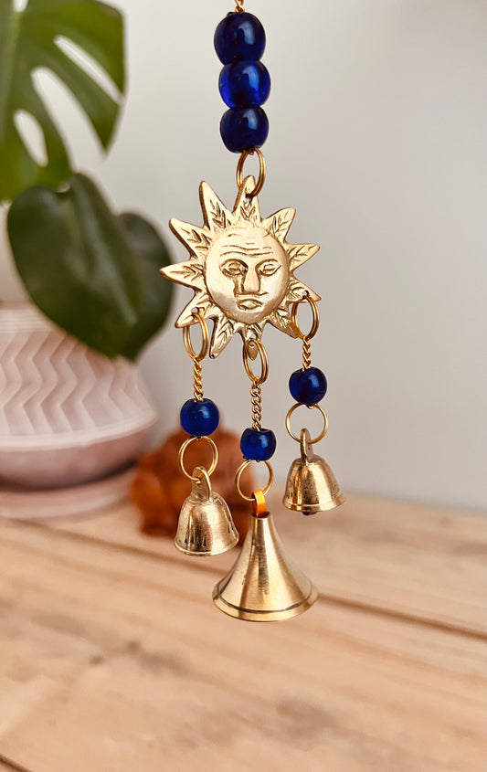 Mini brass sun sunshine small wind chime bell handmade fair trade ethically sourced recycled metal mini bell with colourful beads