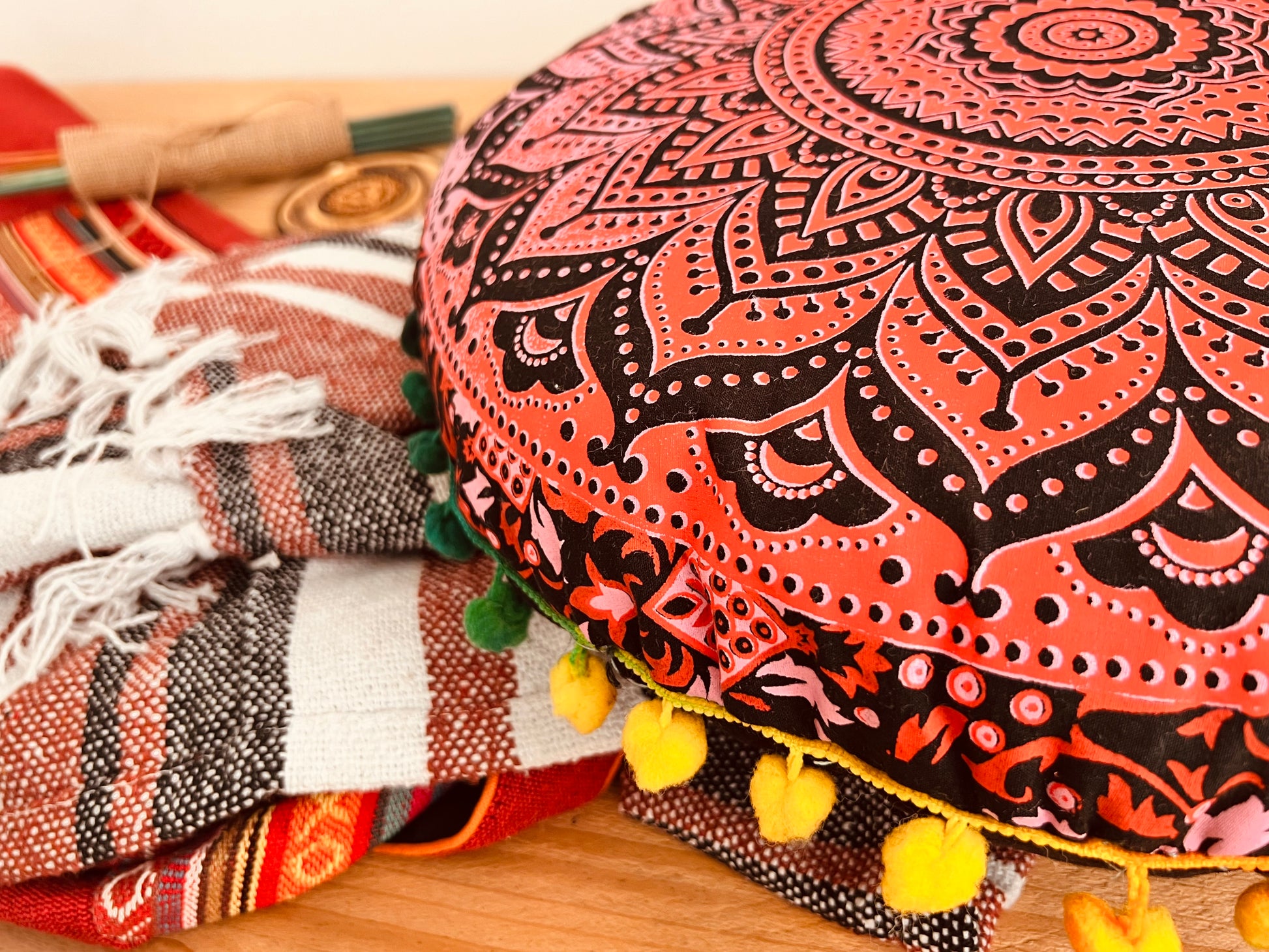 Artisan handcrafted meditation gift set in earthy red tones with mandala print yoga cushion with Pom Pom edge, cotton throw, incense and holder – sustainable mindful living decor