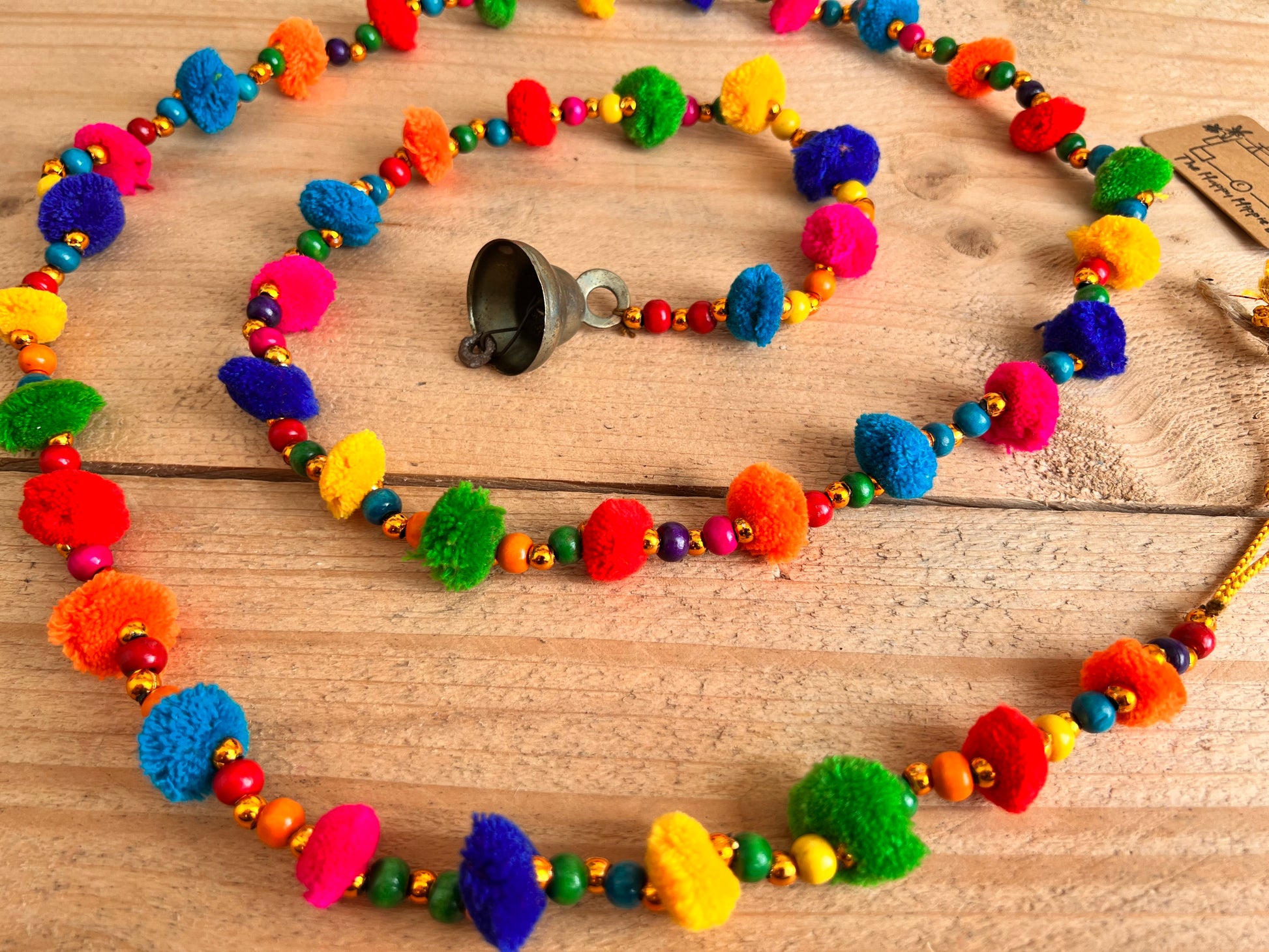 Long string of colourful handmade pom pom bells, hanging string of bells & beads, home living boho hippie decor bells, handmade, fair trade, ethically sourced