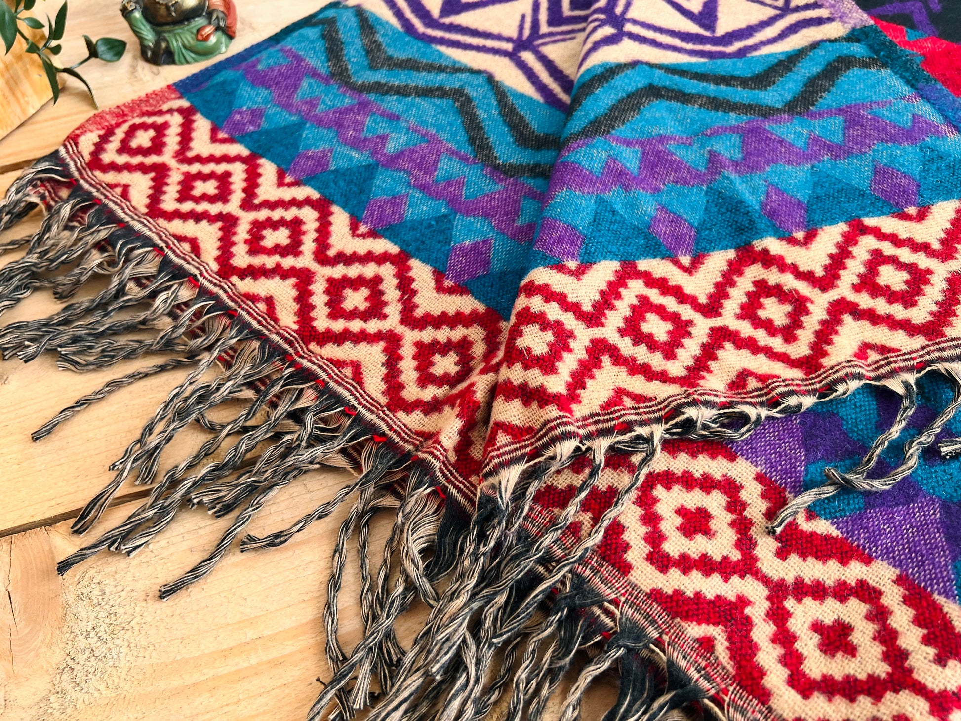 Handmade bright boho blanket in purple blue red 