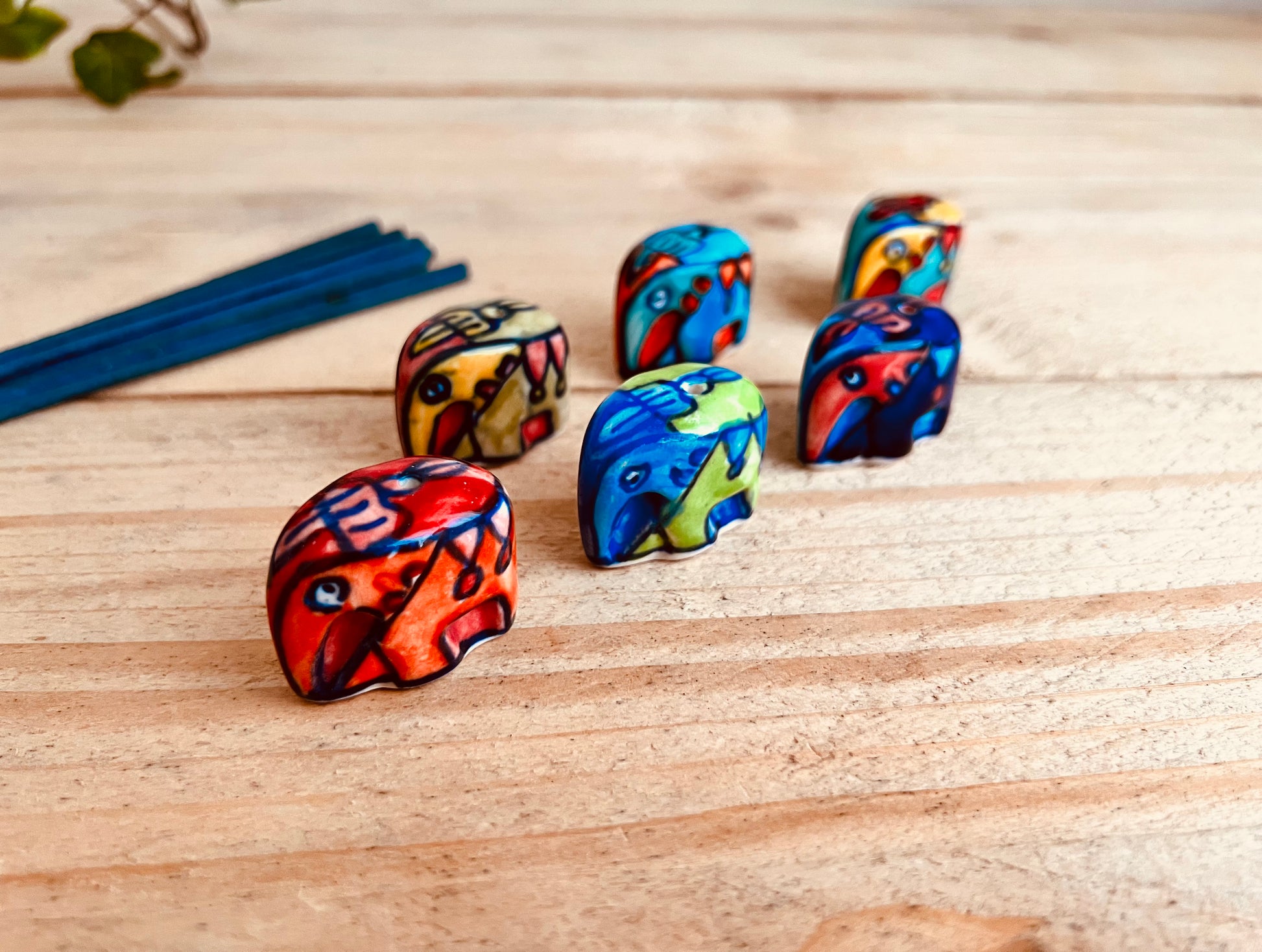 Mini ceramic elephant incense stick holder burner in colourful hand painted designs, handmade fair trade & ethically sourced home decor & home fragrance 