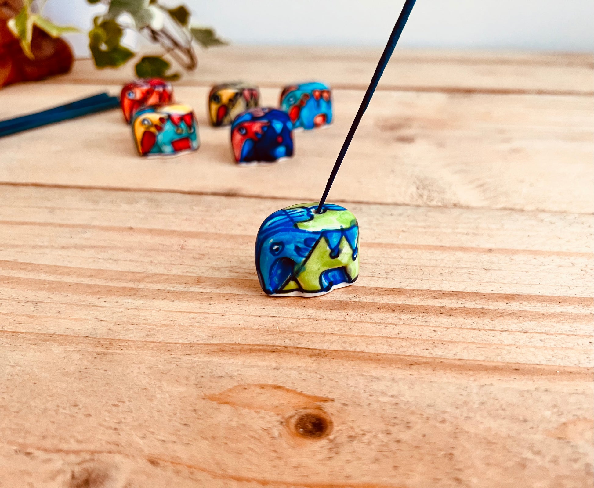 Blue & green Mini ceramic elephant incense stick holder burner in colourful hand painted designs, handmade fair trade & ethically sourced home decor & home fragrance 