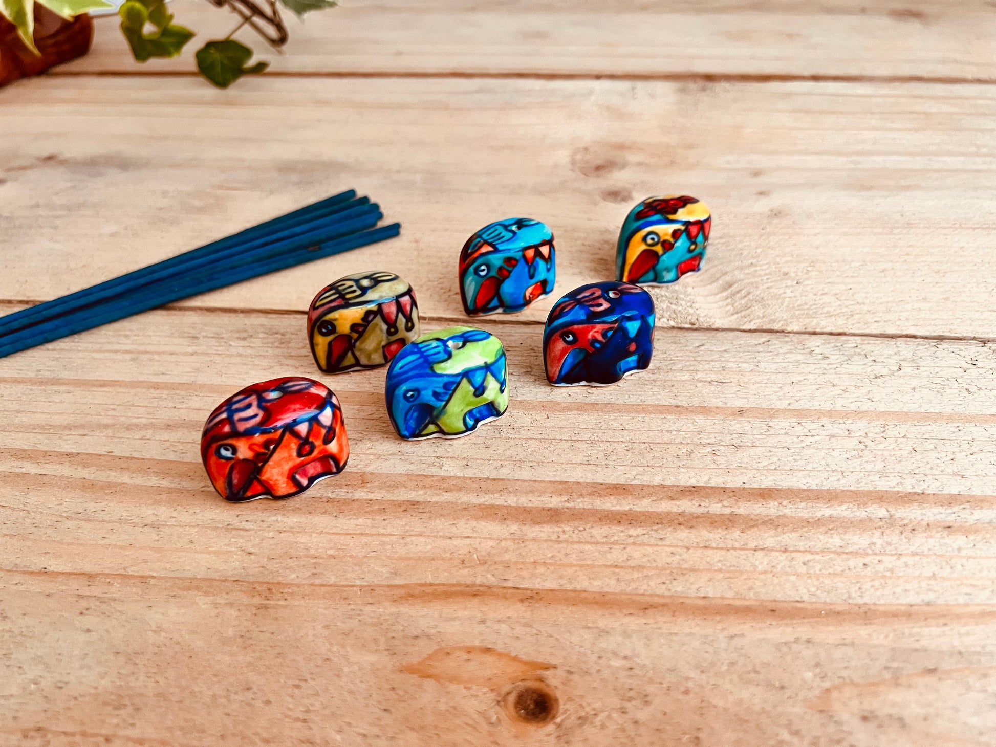 Mini ceramic elephant incense stick holder burner in colourful hand painted designs, handmade fair trade & ethically sourced home decor & home fragrance 