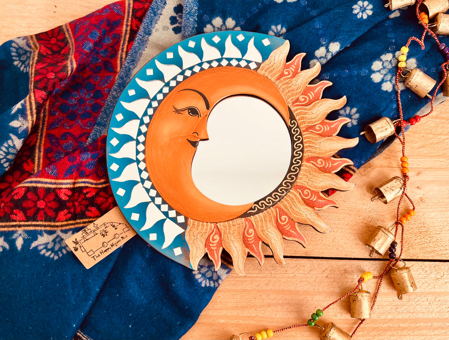 Handmade sun and moon wall mirror with mosaic mirror tile detailing