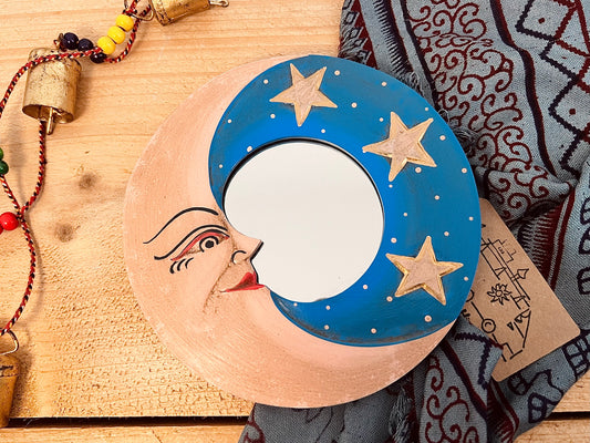 mini wooden wall hanging mirror with hippie boho moon & stars detailing in blue & yellow colour. Bohemian vintage style rustic finish small mini round wooden framed mirror. Handmade, Fair Trade, Ethical, Sustainable home decor.