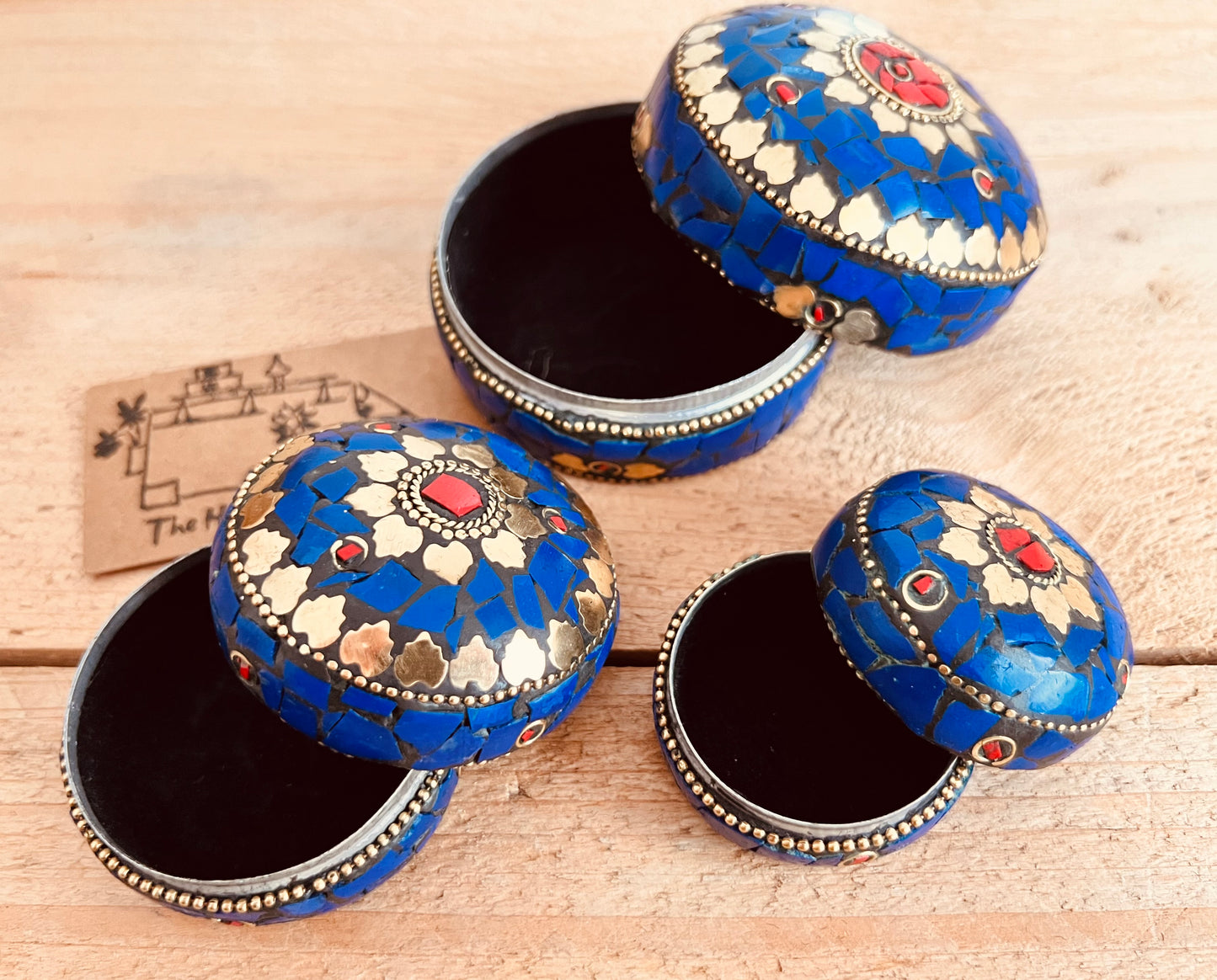 Open blue and gold mosaic trinket box showing metal interior, handmade fair trade box