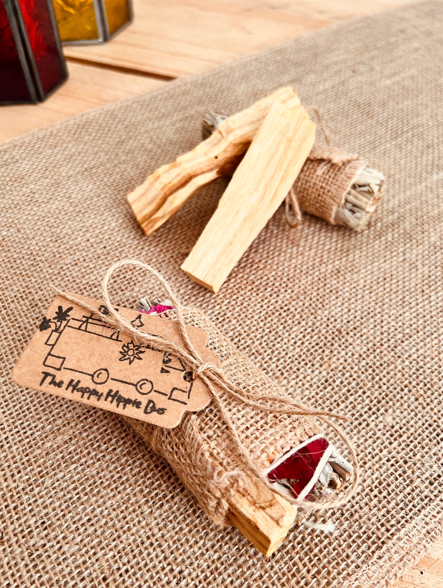 White sage smudge sticks with colourful rose petals wrapped with Palo Santo sticks, home fragrance, cleansing ritual incense 