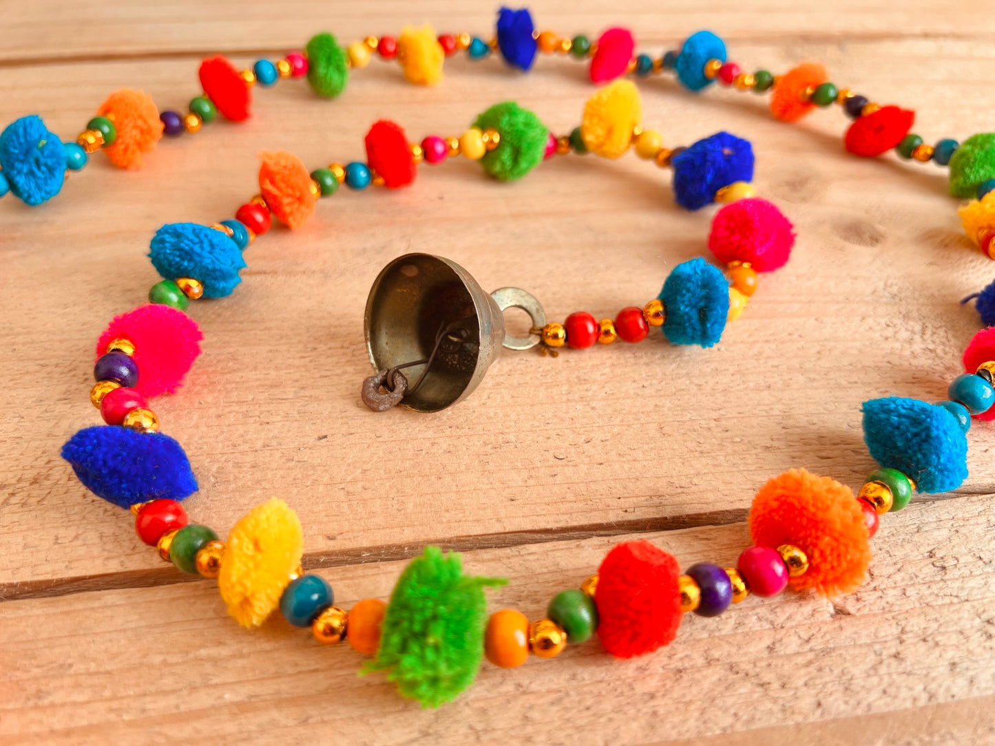 Long string of colourful handmade pom pom bells, hanging string of bells & beads, home living boho hippie decor bells, handmade, fair trade, ethically sourced