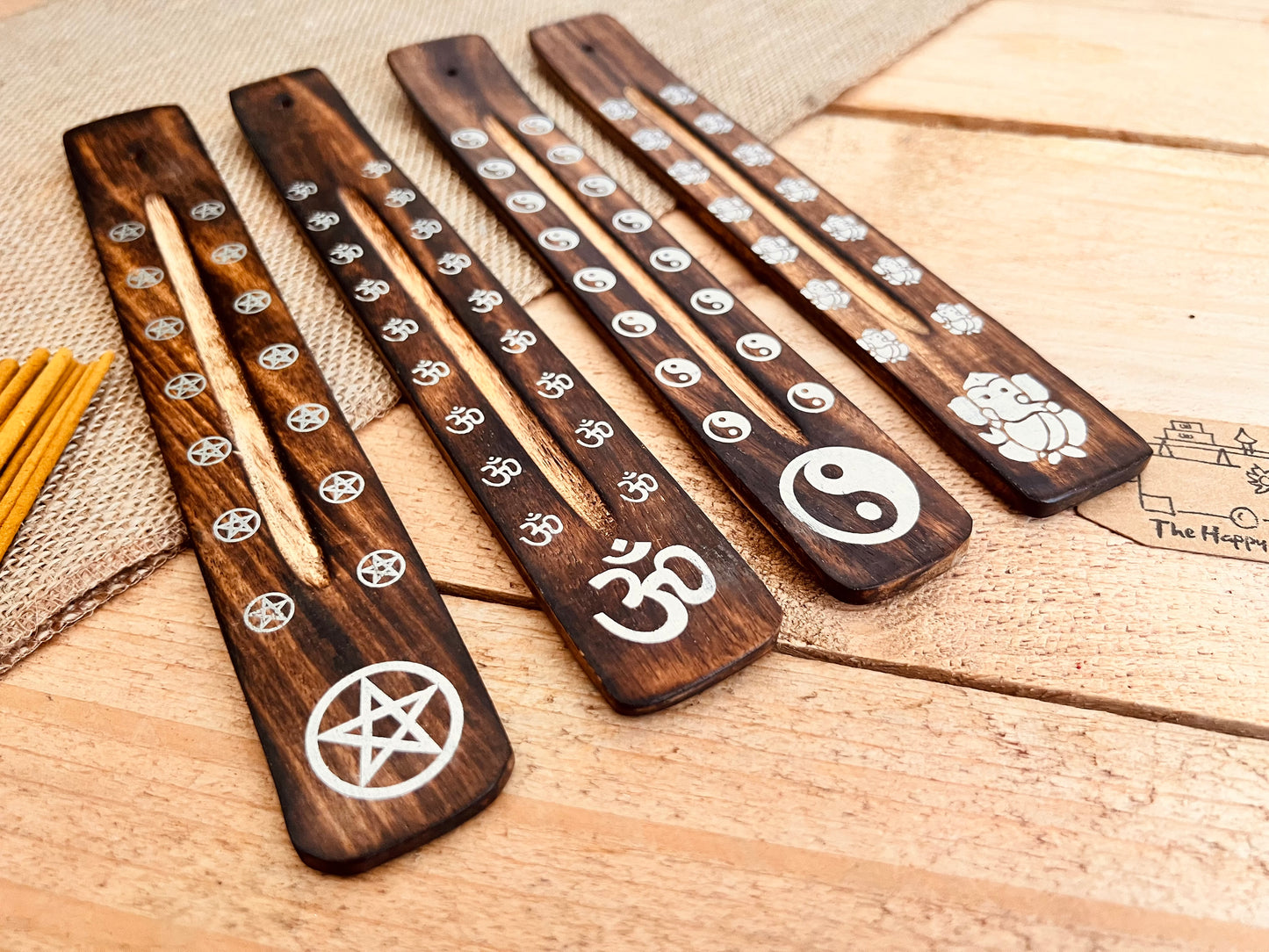 handmade incense stick holder burner with metallic paint printed bohemian hippie chic designs, Om Symbol, Pentagram, Ganesha, Yin Yang incense ash catcher, calming incense sticks, ethically sourced wooden incense holder in dark wood finish