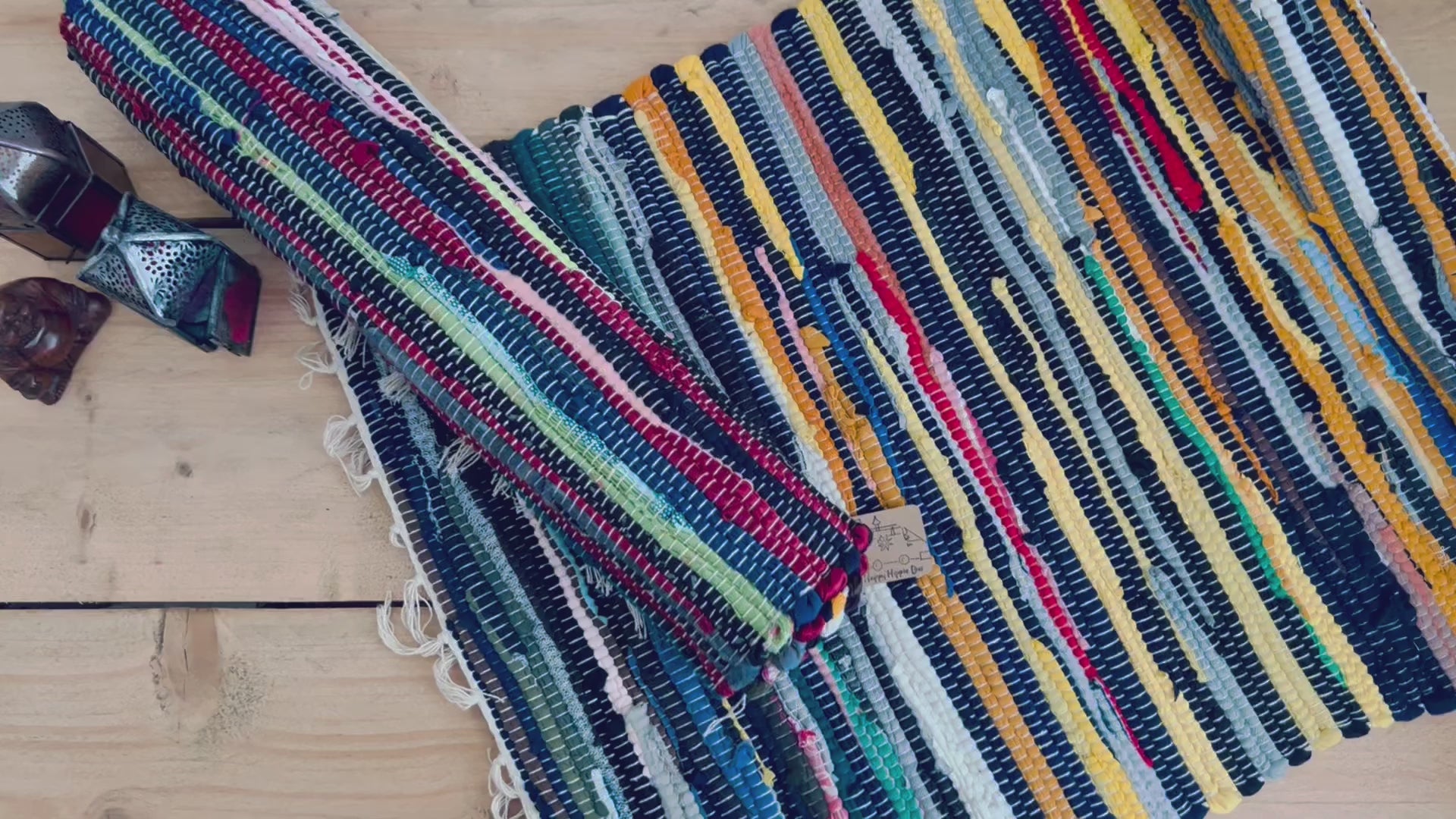handmade fair trade recycled dark blue rag rug with tassels, small sized mini rag rug, multi coloured cotton rug, boho hippie bohemian home decor rug ethically sourced